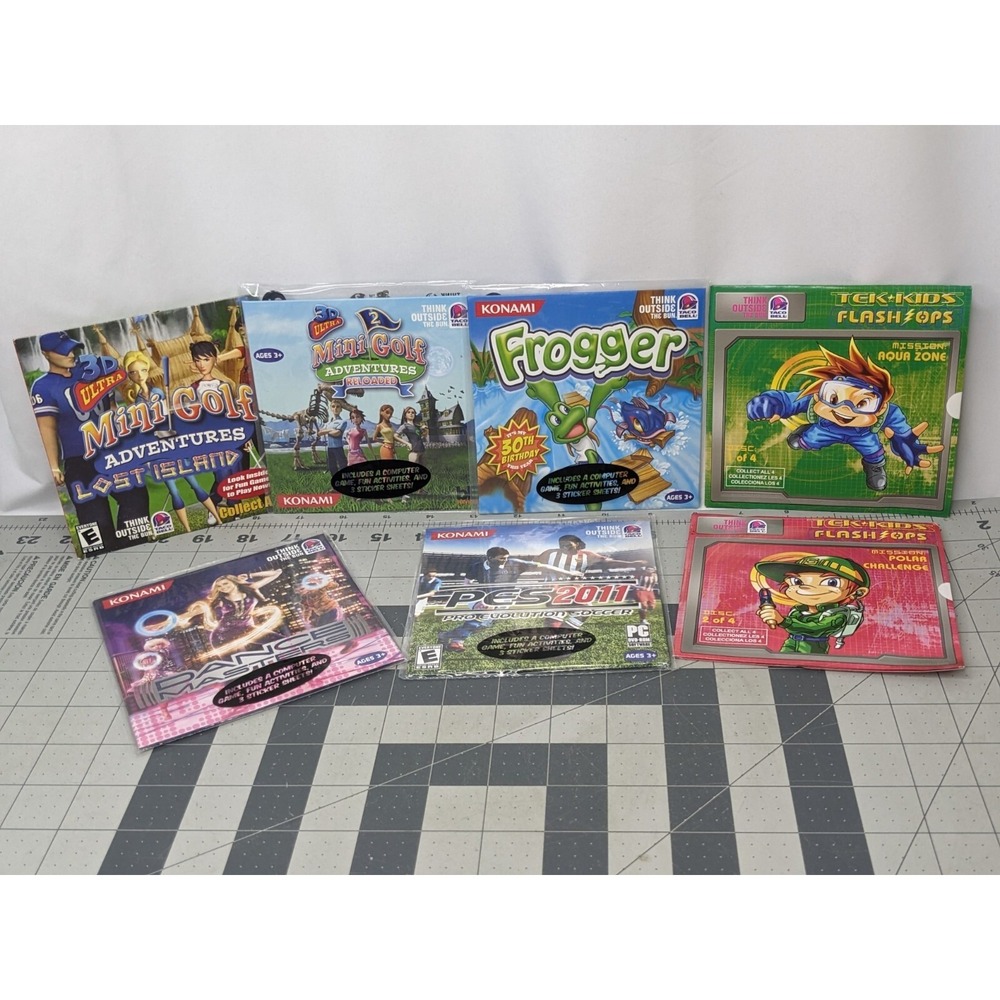 Taco Bell CD Game Lot Mini Golf Tek Kids Lost Island Frogger Soccer Dance